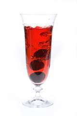 Glass of juice and cherries