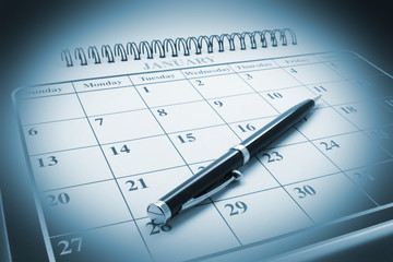 Close Up of Ballpoint Pen on Calendar