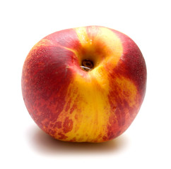 Red peach covered by drops of water. Isolated on the white