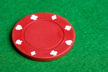 A red $5 poker chip