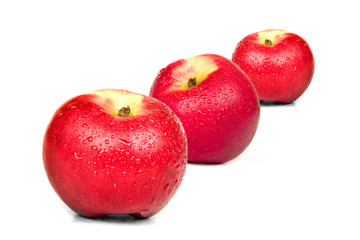 Fototapeta na wymiar Three red apples on white background. Isolated.