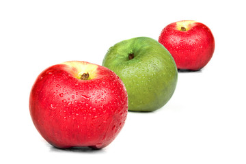Three red and green apples on white background. Isolated.