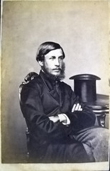 Vintage photo man in the jacket on background.