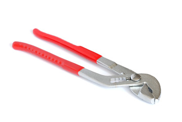 Adjustable spanner with red handles isolated on white background