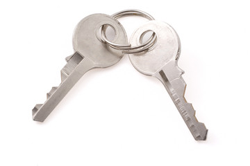 Two small old keys with clipping path on white background