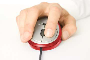 computer mouse with hand on white