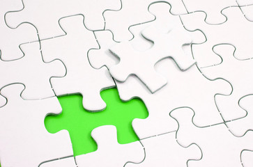 Jigsaw puzzle with a missing piece