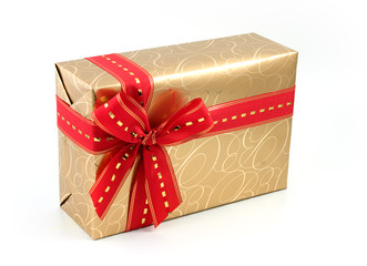 Gold gift box with red ribbon