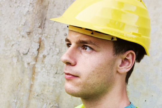 Head portrait of young construction worker