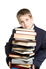 The boy and a pile of books on a white background.