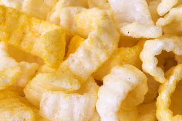 crisp potato chips on a light background