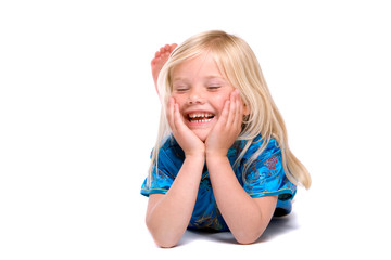 Pretty four year old blond girl having fun