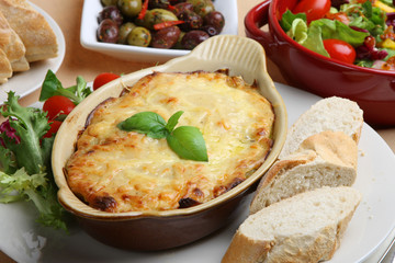 Lasagna with Italian salad and a crusty baguette