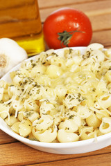 Cooked italian pasta with cheese and tomato. Shallow DOF