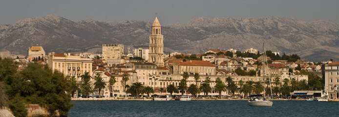 Split waterfront with the moutains in the background.