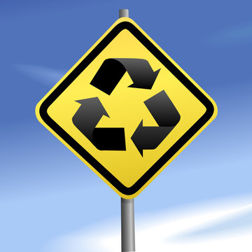 Directions To Recycle On Yellow Traffic Sign & Blue Sky