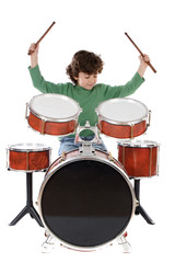 Beautiful boy playing the drums on a white background