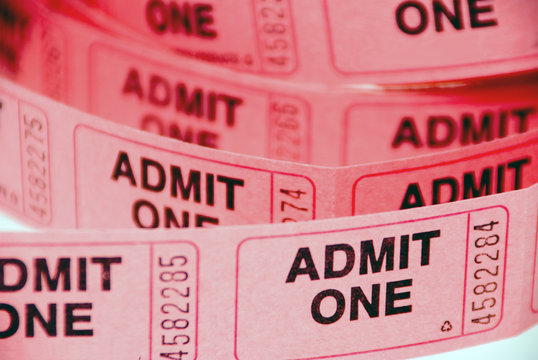 A small roll of retail admission tickets.