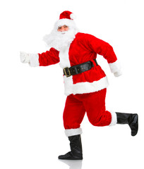 Happy running Christmas Santas. Isolated over white background.