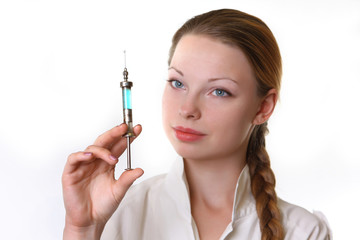 Doctor keeps in the hands of the syringe