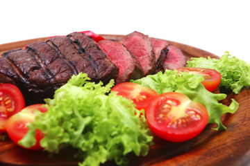 fresh roast beef steak and vegetables