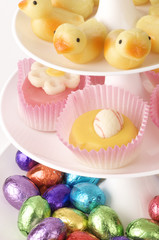a close-up of a tray filled with various easter candy