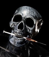 skull with needle. Drugs kill