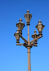 Fototapeta na wymiar Old lantern on dark blue sky background