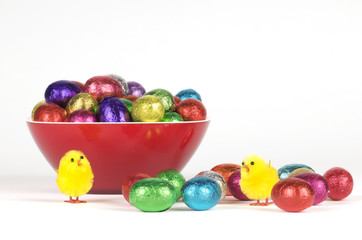 a dish filled with colorful easter chocolates