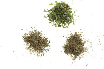 Dried Herbs. Parsley, Thyme, and Basil on white