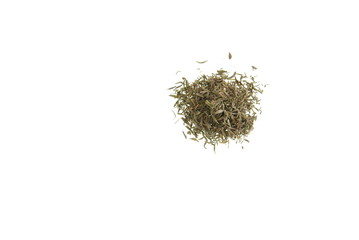 Small pile of dried thyme herb on white