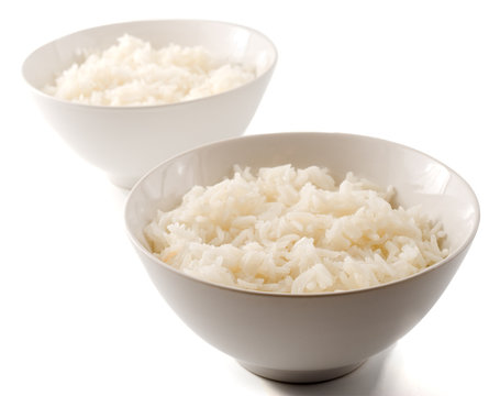 two bowls of plain rice  isolated on on white
