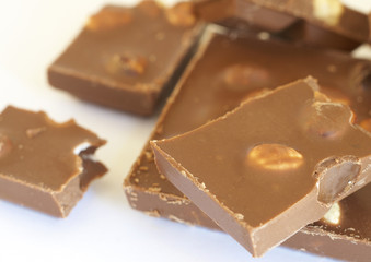 Slab of chocolate with nuts broken into pieces