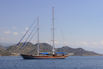 Fototapeta premium Sailboat without sail in the bay. White Sea.