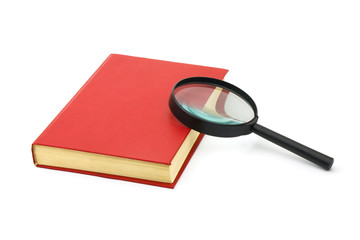 Magnifying glass and book isolated on white background