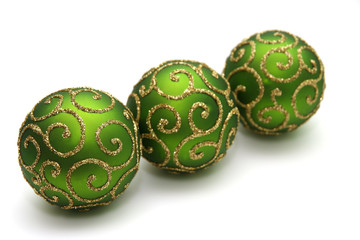 Green decoration balls isolated on white.