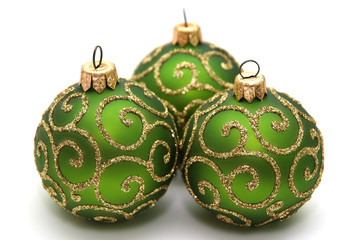 Green decoration balls isolated on white.