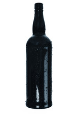 Bottle and drops of a condensate on a white  background