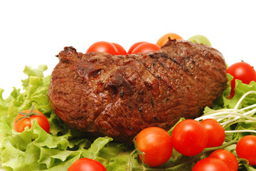 meat and vegetables on transparent dish