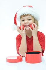 little Santa girl and Christmas baubles, on white