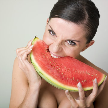woman eating  watermelon