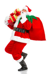 Happy Christmas Santa with gifts. Over white background.