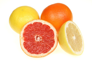Red and yellow grapefruit. Citrus fruits isolated on white.