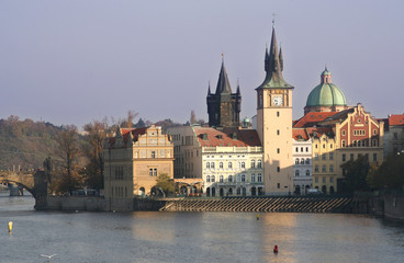 Fototapeta na wymiar Clock tower at the Charles Bridge in Prague