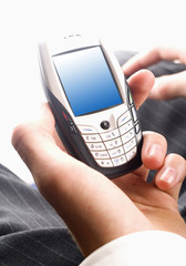 business man using his cell phone