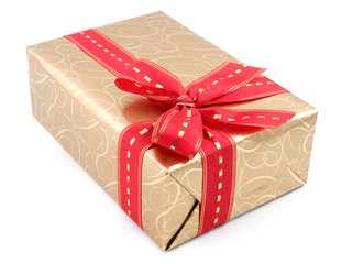 Gold gift box with ribbon and bow