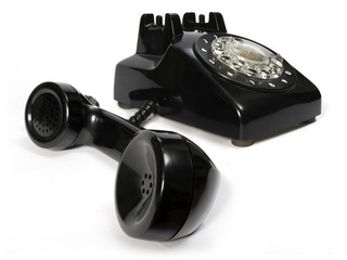 Old telephone in black color.