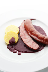 Pork sausage with red wine Goulash and Polenta
