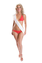 Obraz premium Smiling young curly blonde woman in the red bikini