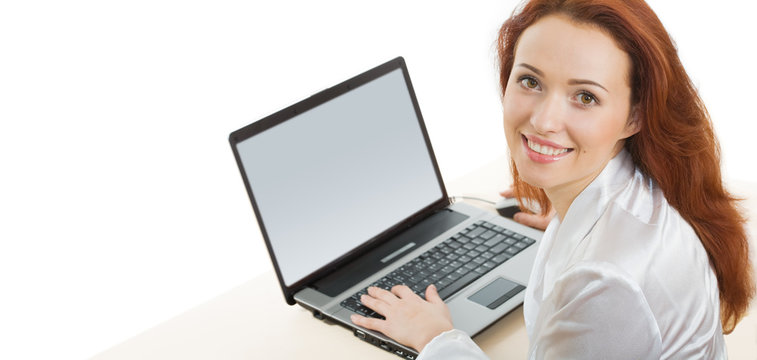 Portrait of businesswoman with laptop on a white background